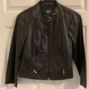 XL Practically new. Genuine leather Moto jacket. No rips no tears.